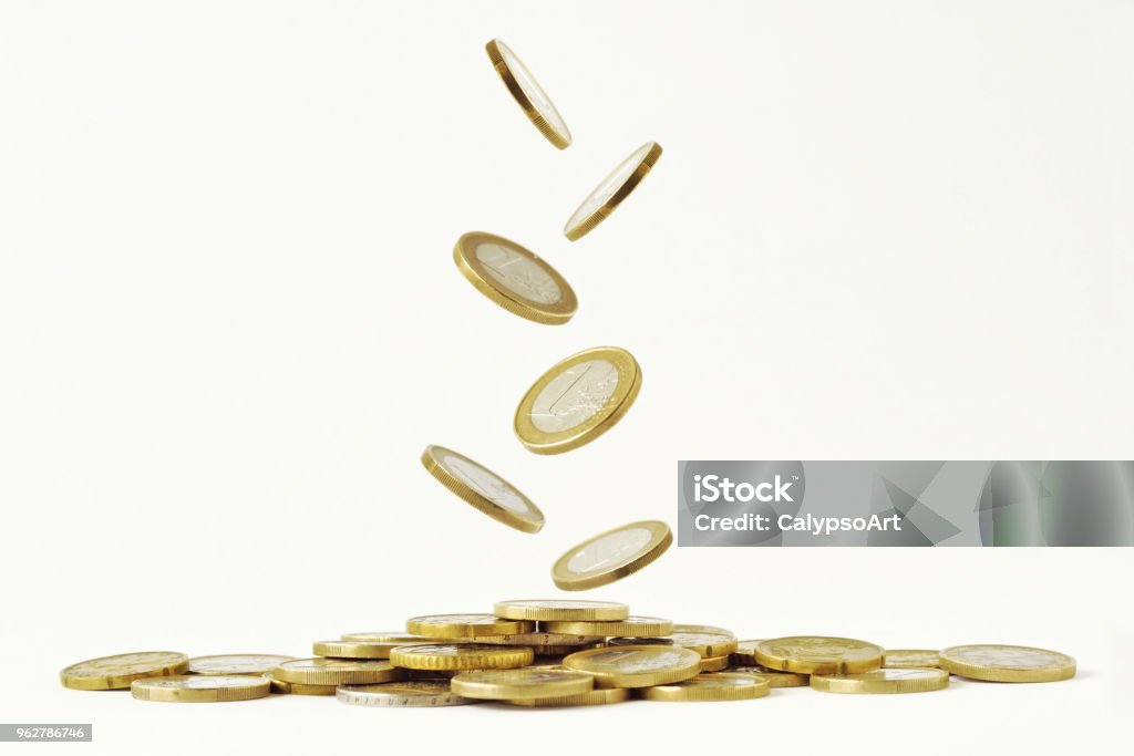 Falling euro coins on white background Currency Stock Photo