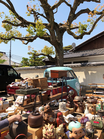 Shitennoji Temple in Osaka, Japan - March 21, 2018\nFlea market held on the 21st and 22th of every month.\nIt is said that the flea market of Shitennoji Temple has continued since the Edo period. It is crowded with many customers looking for kimonos, antique furnitures, potteries, accessories and old watches etc.