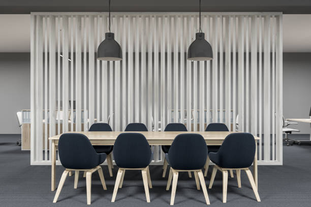istock Wooden meeting room, black chairs 962789730