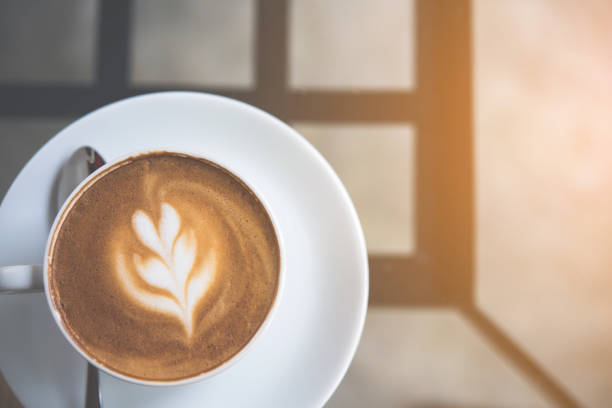 istock Latte coffee on the table in cafe 962798544