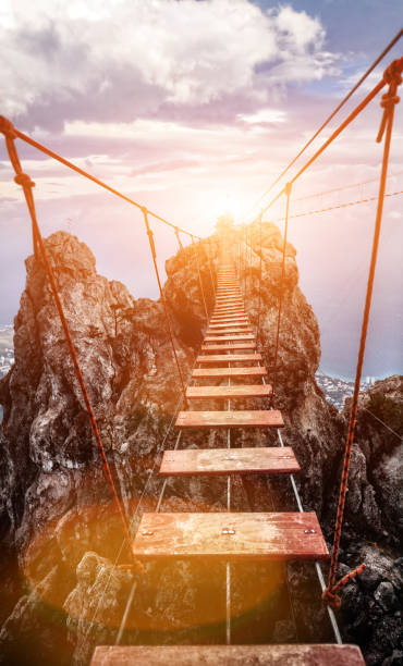 istock Suspension bridge on the Mount. path to the light 962798616