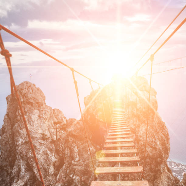 istock Suspension bridge on the Mount. path to the light 962798668