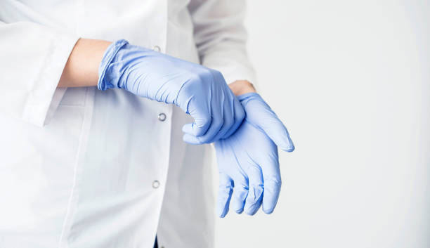 concetto medico e sanitario del medico - glove surgical glove human hand protective glove foto e immagini stock