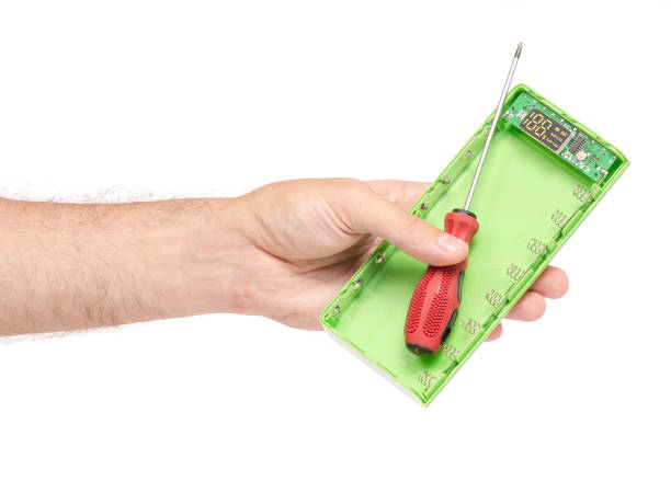 istock Power bank screwdriverin a hand repair 962812712