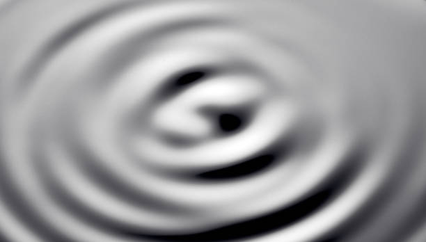 istock Movement of water - Abstract Black Background Liquid Texture. liquid abstraction 962816374