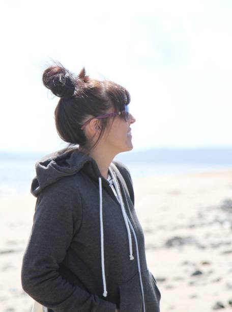 istock side-view of woman at beach 962816846