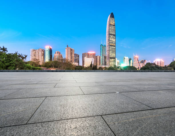 istock empty square floors and modern city skyline in Shenzhen at night 962817568