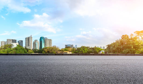 istock empty asphalt road and modern city skyline in Shenzhen 962821540