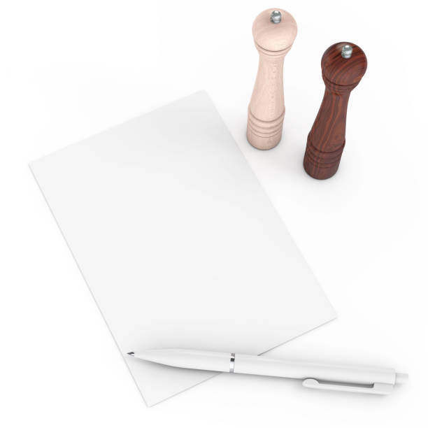 istock Kitchen Wire Whisk Eggs Beater over Blank Recipe Paper. 3d Rendering 962823234