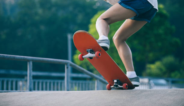 istock skateboarder skateboarding on skatepark ramp 962829840