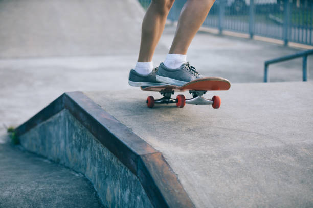 istock skateboarder skateboarding on skatepark ramp 962831412