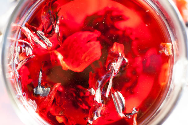 istock Red Hot Hibiscus tea in a glass mug 962831482