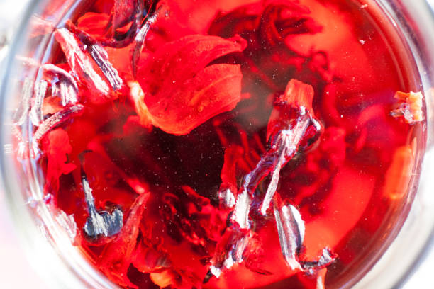 istock Red Hot Hibiscus tea in a glass mug 962831498