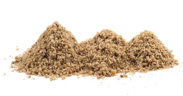 istock Pile of sand isolated on a white background 962831636
