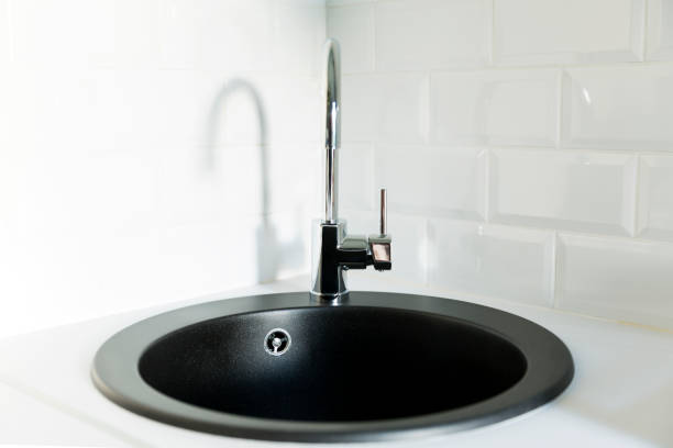 istock Black kitchen sink and faucet. Scandinavian style kitchen 962832384