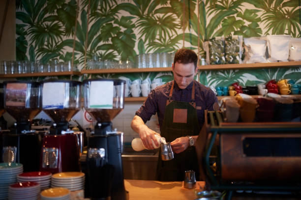 istock Barista in coffee shop 962833226