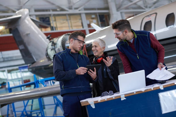 istock Aircraft mechanics in the hangar 962834146