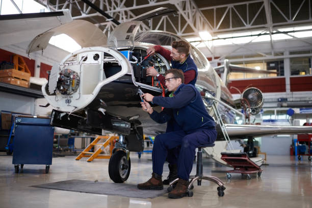istock Aircraft mechanics in the hangar 962836338