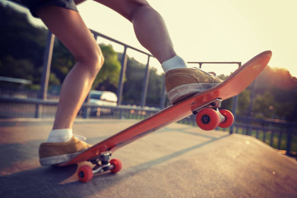 istock skateboarder skateboarding on skatepark ramp 962836404