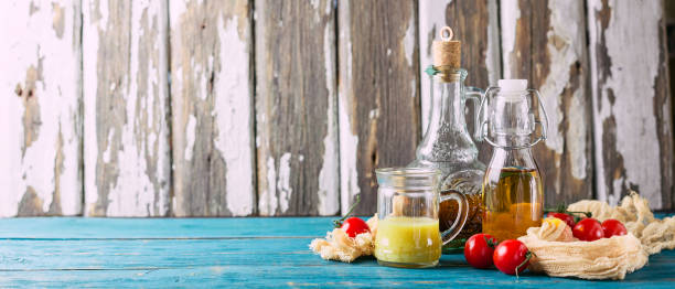 homemade sauces and salad dressings - vinegar salad dressing balsamic vinegar olive oil imagens e fotografias de stock