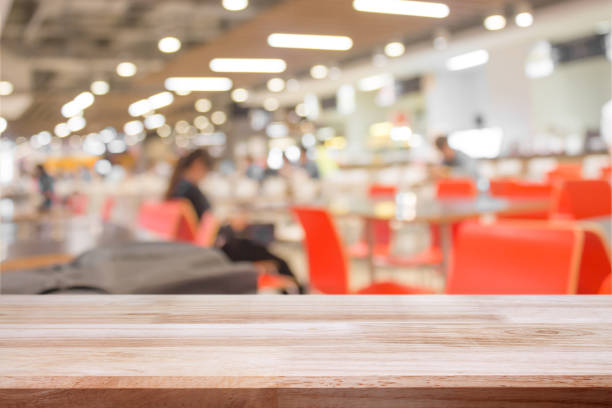 istock empty wooden on blurred restaurant backdrop. Wood table top. can used for display or montage your products 962838018