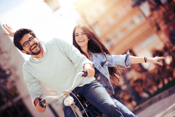 istock Cheerful young couple having fun outdoors 962842260