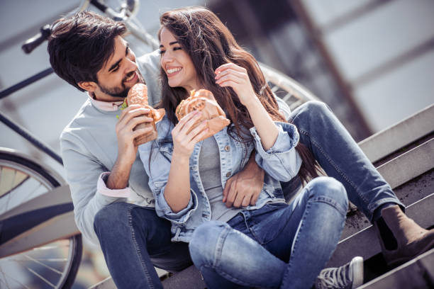 istock Cheerful young couple having fun outdoors 962842318