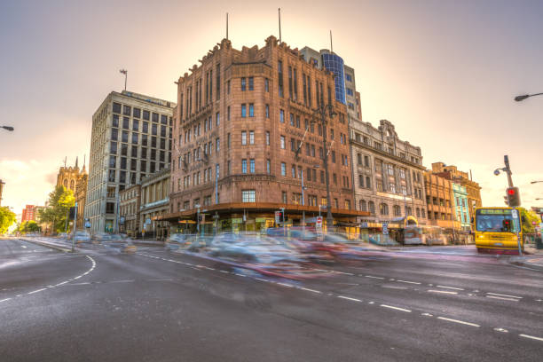 Hobart, Tasmania, Australia - January 16, 2015: Traffic in the center of Hobart town at sunset. Photo taken with motion effect for cars