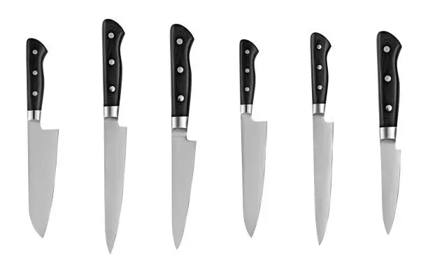 Set of steel kitchen knives, isolated on white background with clipping path. Chef knife.