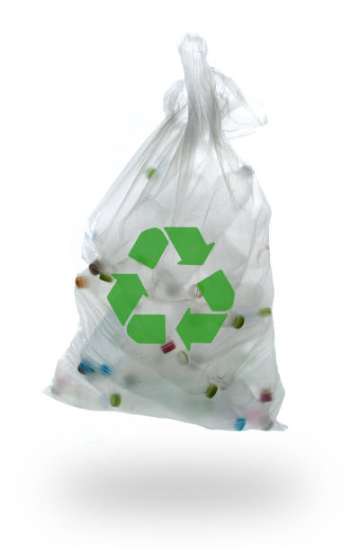istock garbage bag with plastic bottles on a white background.,recycling concept 962850114