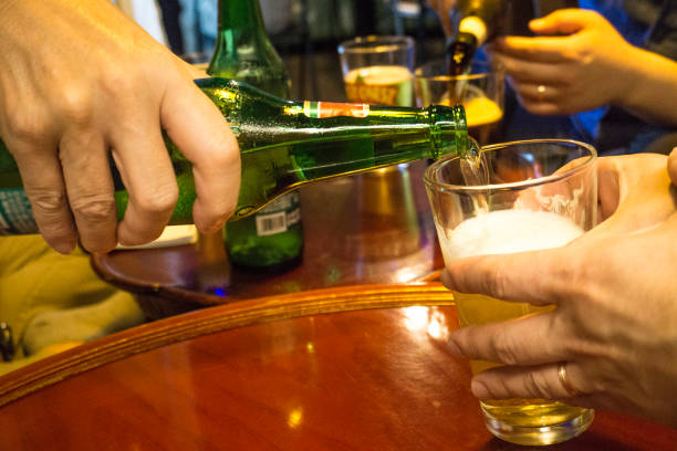 istock cold bottles of beer in bucket with ice in a restaurant setting 962853330