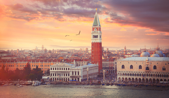 Panoramic view of Piazza San Marco with St Mark's Campanile in Venice in sunset light