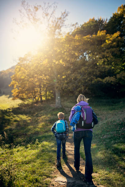 istock Mother and son hiking 962859400