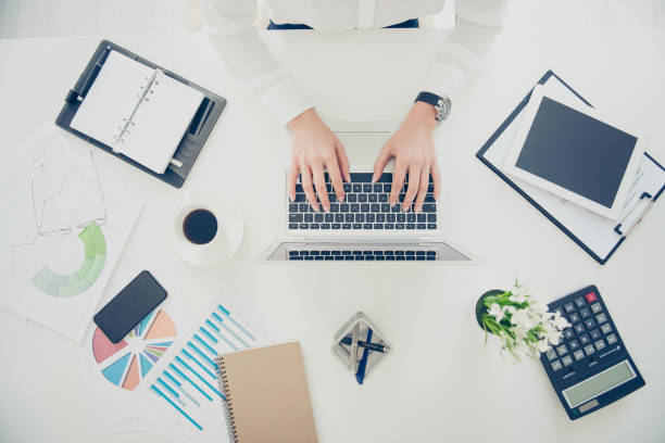istock Top view cropped portrait of woman's hands typing on keyboard using wifi internet, chatting with partners, checking email, secretary working on laptop making presentation, report 962859840
