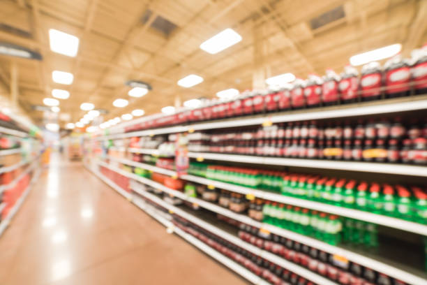 istock Abstract blurred background soft drinks aisle in American store 962866720