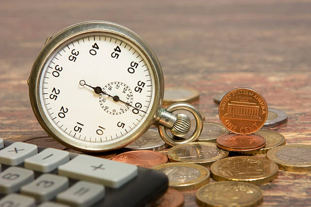 시간 및 시간과 - finance photography us currency stopwatch 뉴스 사진 이미지