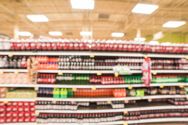 istock Abstract blurred background soft drinks aisle in American store 962867066
