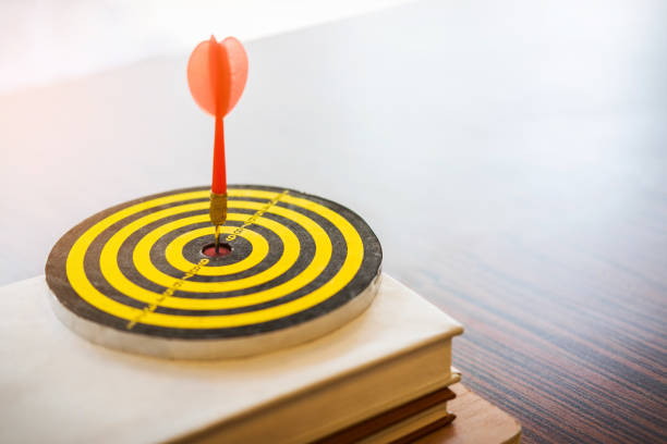 istock Close-Up Of Dartboard With Arrow 962868242