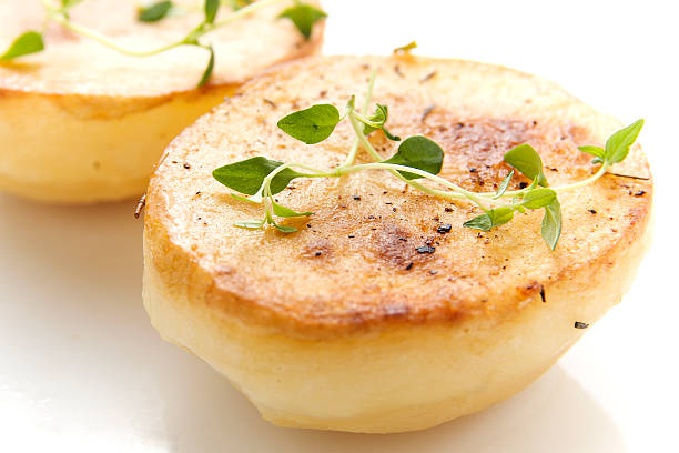 Fondant Potatoes stock photo