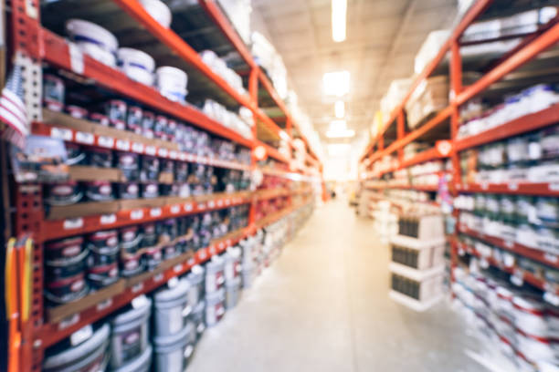 istock Vintage blurred interior, exterior paint at large hardware store in USA 962884514