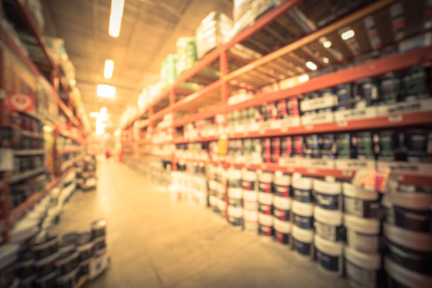 istock Blurred paint at large hardware store in USA  customer shopping 962885010