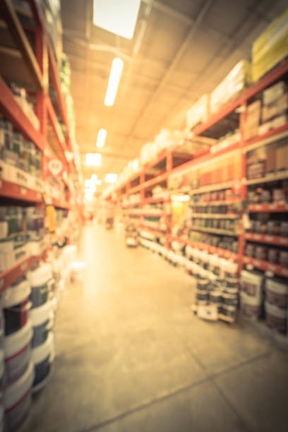 istock Vintage blurred interior, exterior paint at large hardware store in USA 962887088