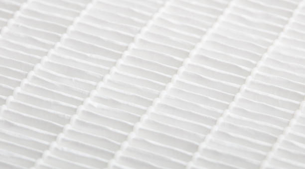 istock Closeup view on air filter. Filtration concept. High efficiency air filter for HVAC system. 962888500