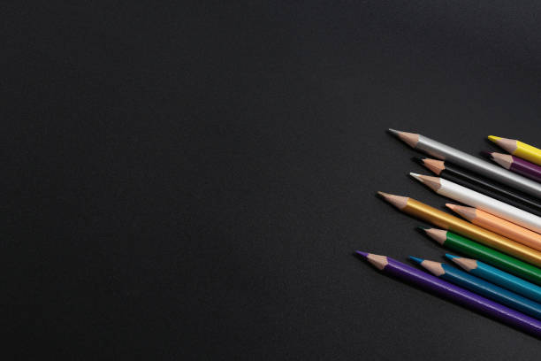 istock group of pencils on the black background with copy space 962892724