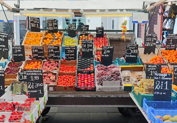 Fresh fruits market stall stock photo