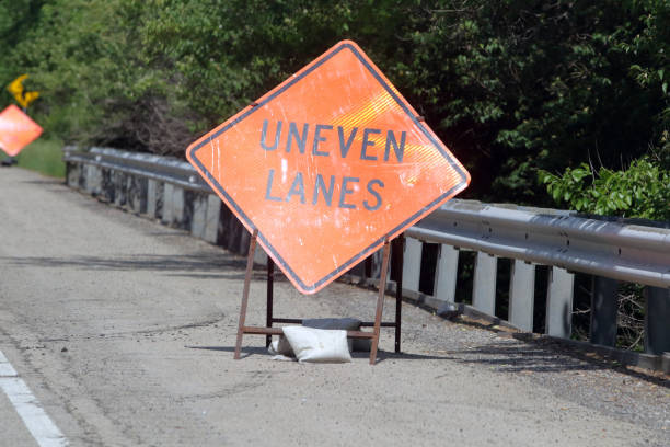 istock Uneven Lanes sign 962898060