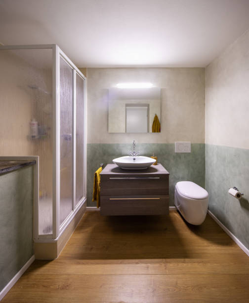 istock Bathroom with modern finishes and white walls 962898456