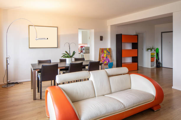 istock Living room with leather and parquet design sofa 962898684