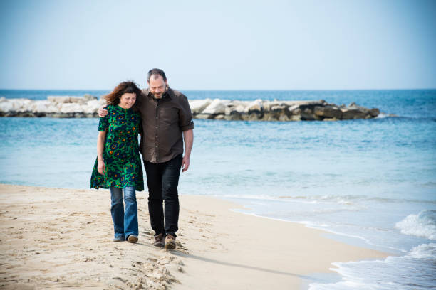 Couple walking on the beach