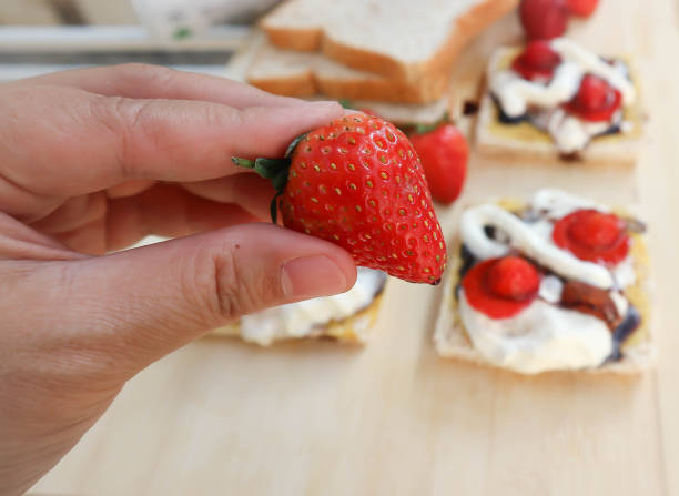 pick strawberry or bread and canape with strawberry topping